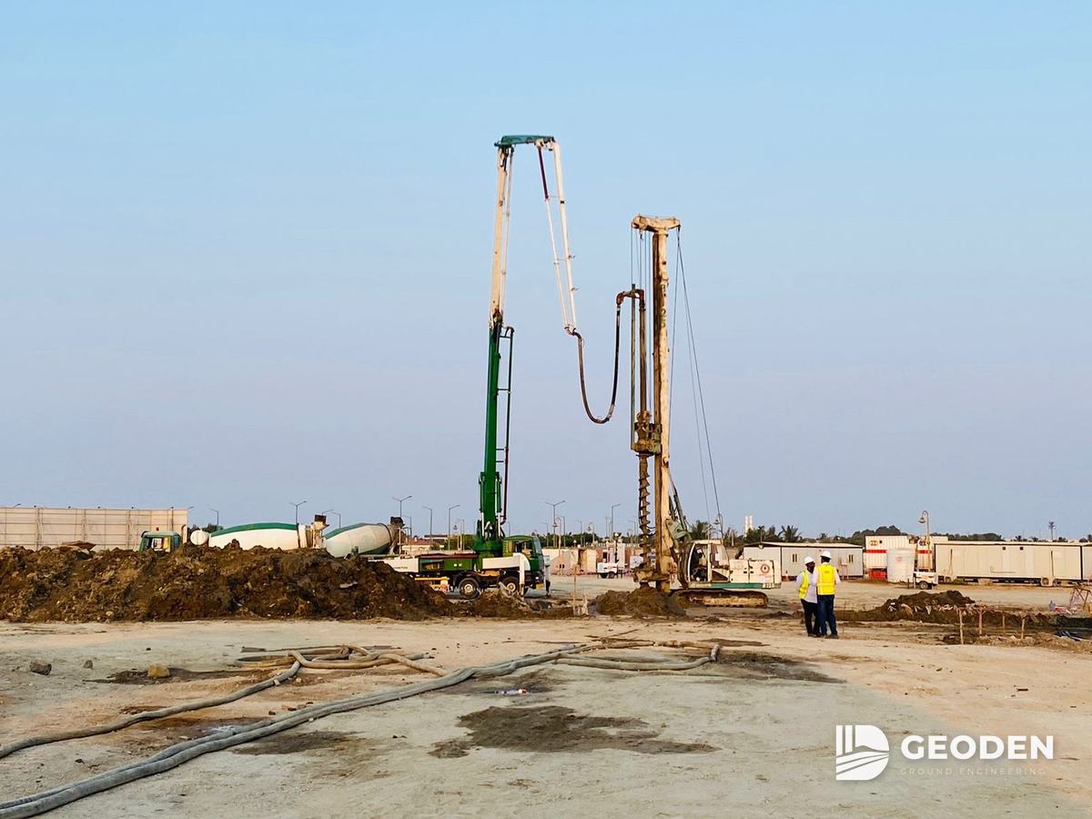 Two rigs installing rigid inclusions on a prepared platform